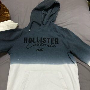 Blue and white ombré with black lettering